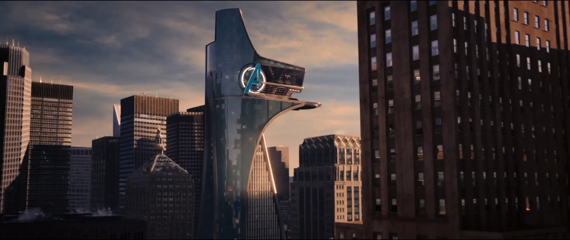 The Avengers Tower in New York. It is a glass building with a stylised “A” in blue.