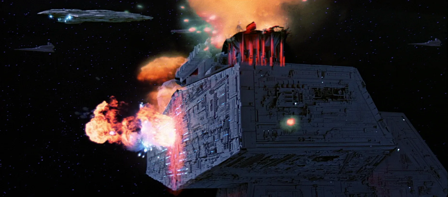 The bridge superstructure of the Executer is shown exploding.