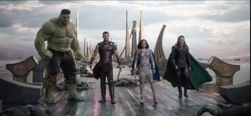 Hulk (Mark Ruffalo), Thor (Chris Hemsworth), Valkyrie (Tessa Thompson), and Loki (Tom Hiddleston) stand on the Rainbow Bridge.