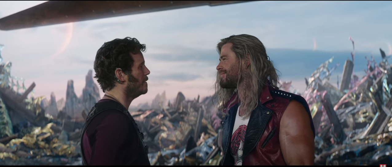 Star-Lord (Chris Pratt) and Thor (Chris Hemsworth) face one another on an alien world.