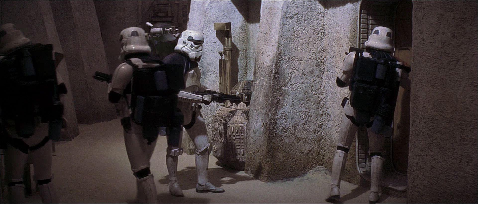 Imperial Stormtroopers go door-to-door in the streets of Mos Eisley.
