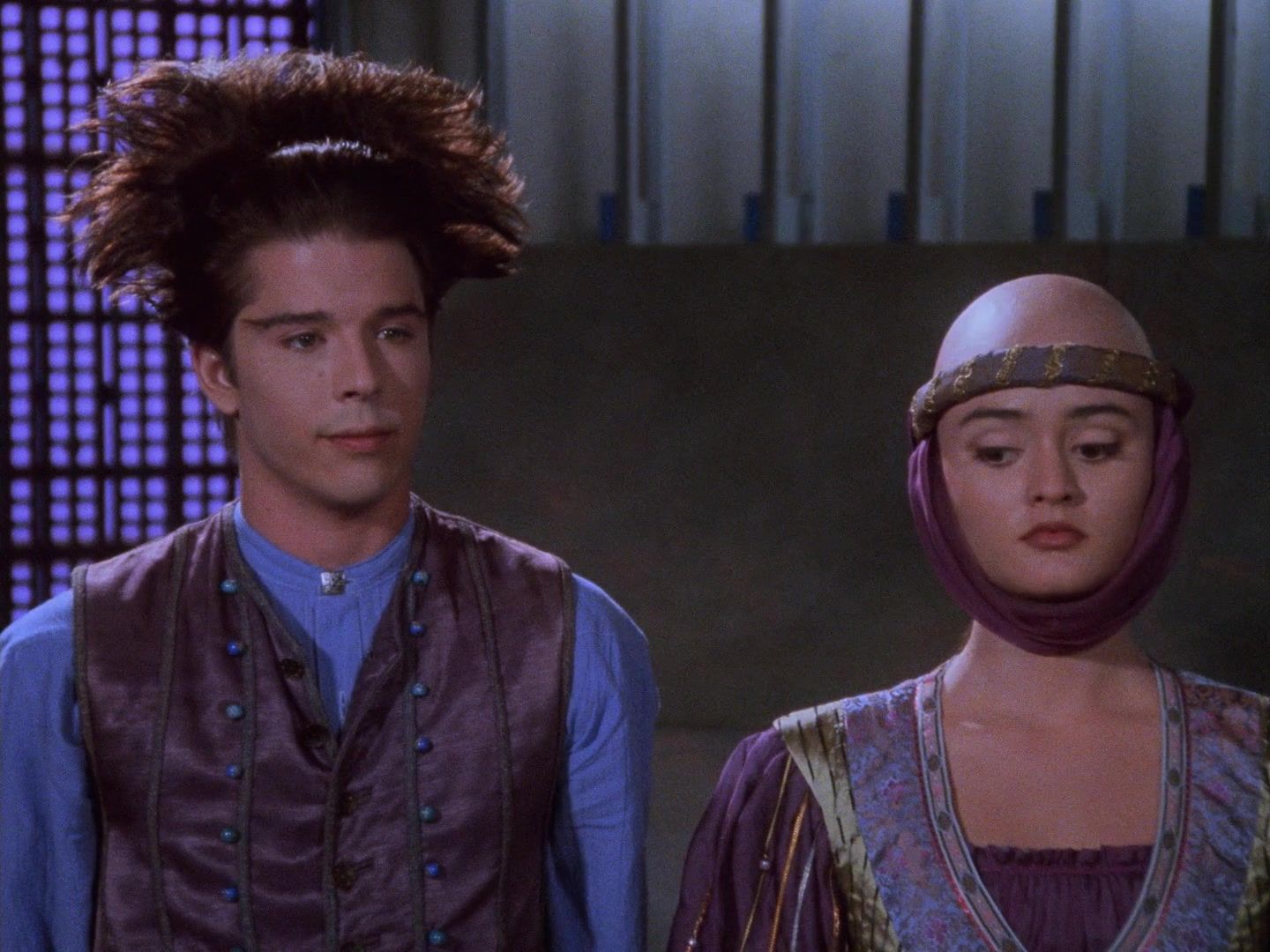 Kiron Maray (Rodney Eastman), with florid hair, and the bald Aria Tensus (Danica McKellar).