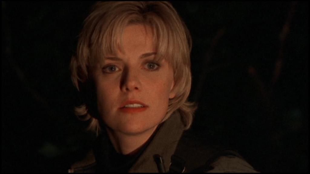 Samantha Carter (Amanda Tapping) with a long pixie, or lixie, hairstyle in Stargate SG-1.