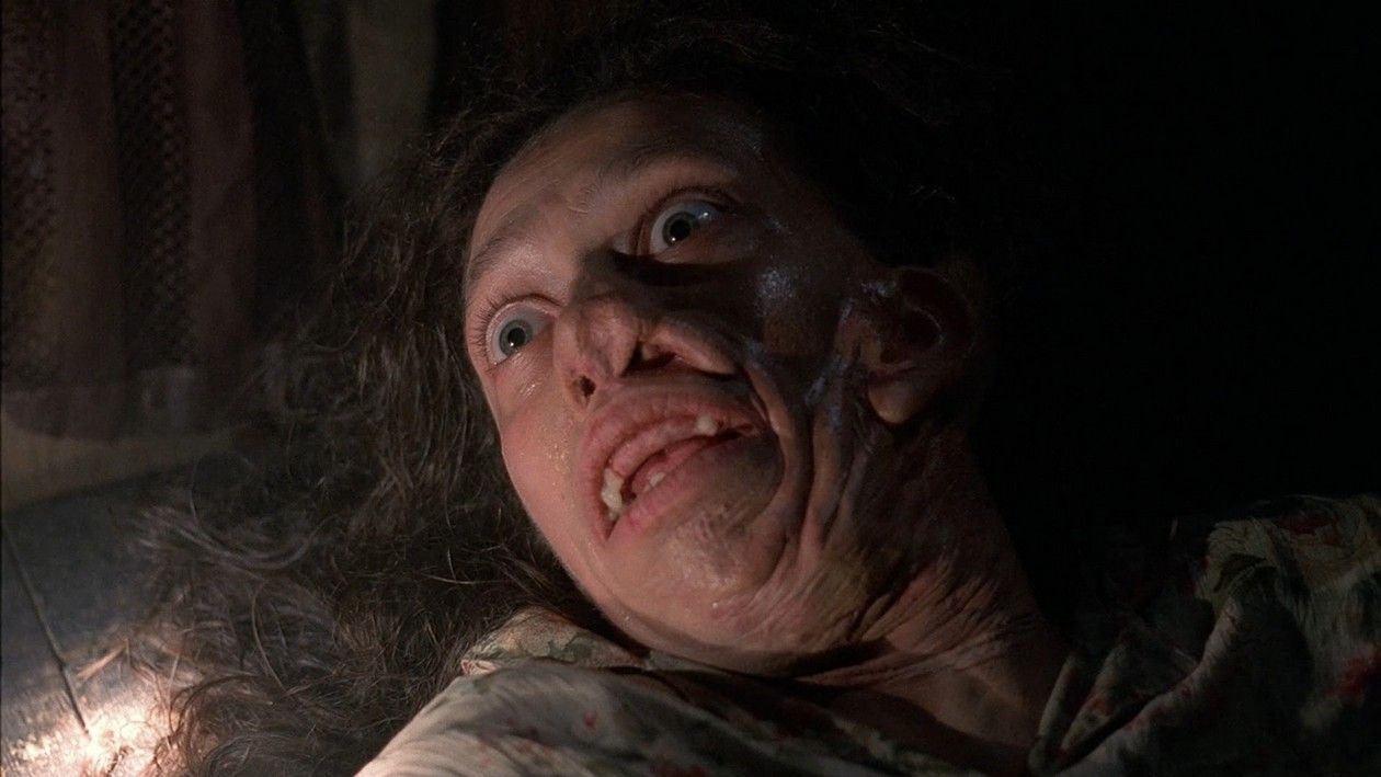 The physically deformed Mrs. Peacock, played by Karin Konoval, lays on the floor in the light of a torch  in The X-Files episode ‘Home’ (S4, Ep2).