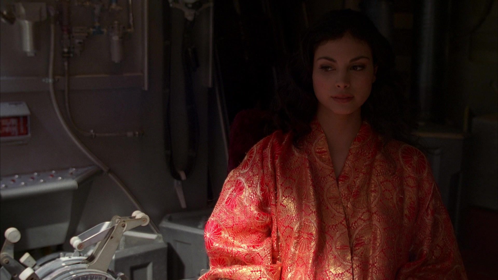 Inara Serra (Morena Baccarin) in the Firefly episode ‘Serenity’. She is standing in her decadently decorated chamber aboard Serenity.