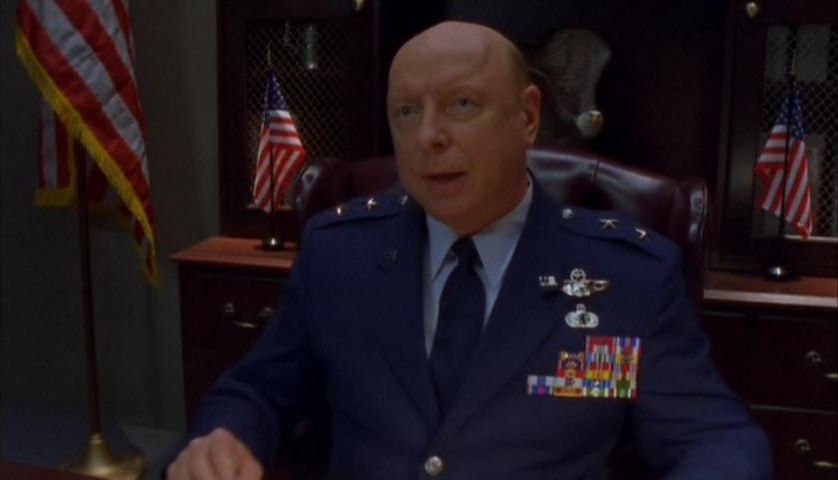 General Hammond (Don S. Davis) wearing his dark blue dress uniform in Stargate SG-1's ‘Children of the Gods: The Final Cut’. 