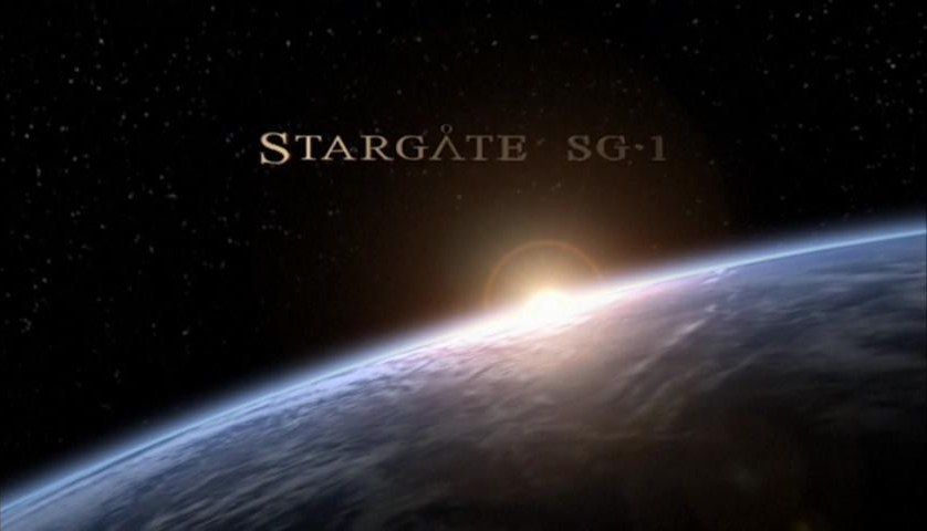 The sun breaks over the surface of the Earth. The words Stargate SG-1 appear at the top of the screen.