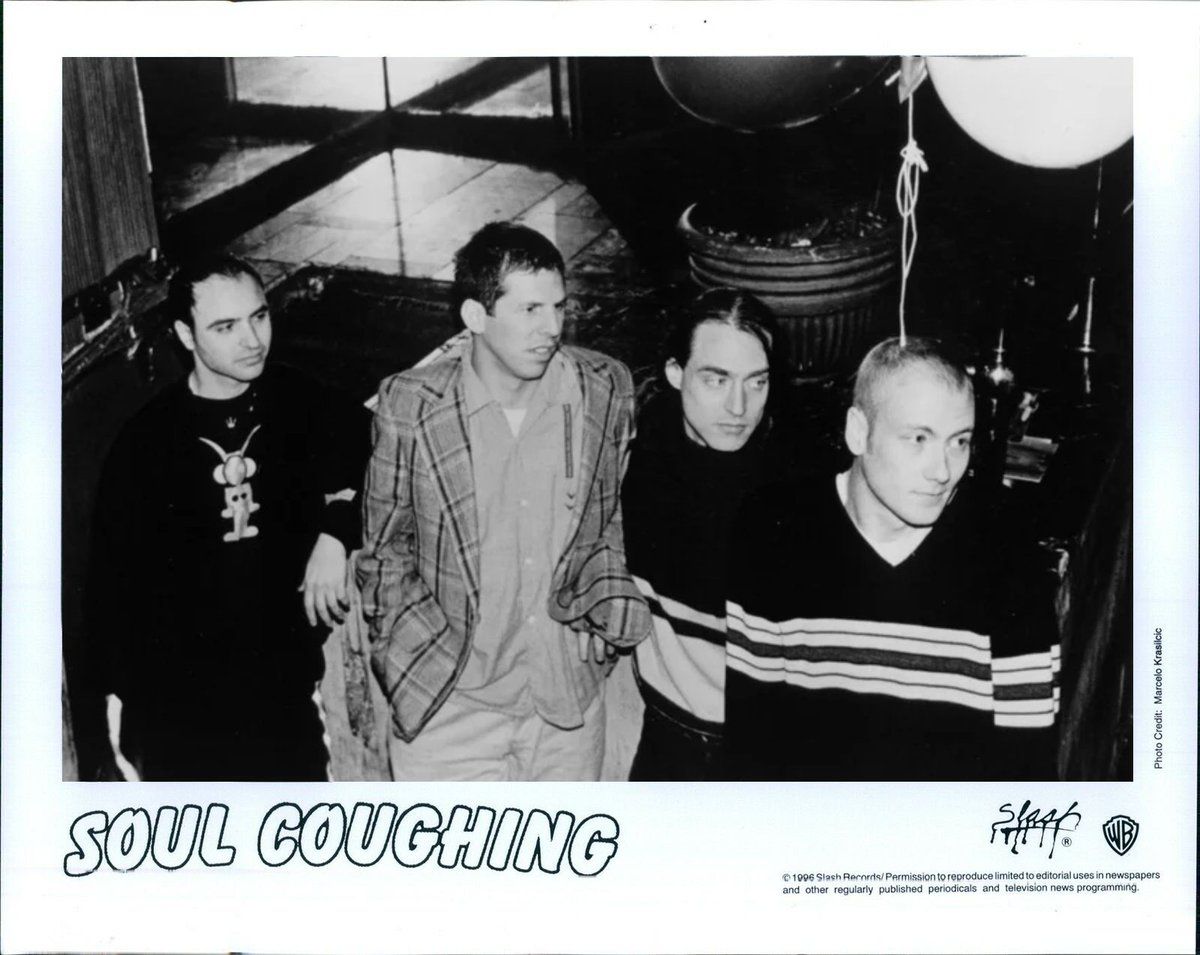 A promotional photograph showing the four members of Soul Coughing