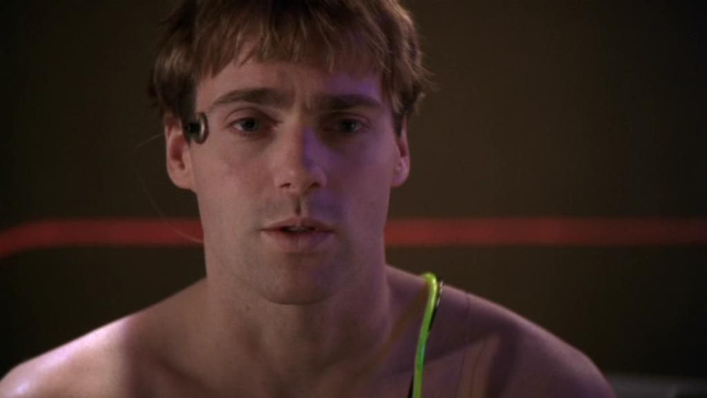 Daniel Jackson (Michael Shanks) is shirtless with wires from his temples.