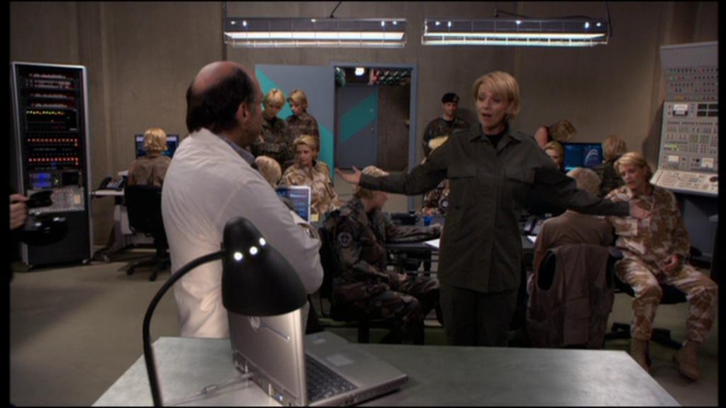 Multiple Samantha Carters (Amanda Tapping) work in a lab.