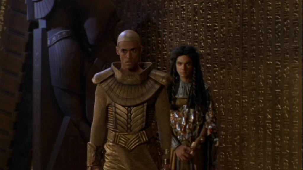 Apophis (Peter Williams) and Skaara/Klorel (ALexis Cruz) side-by-side.