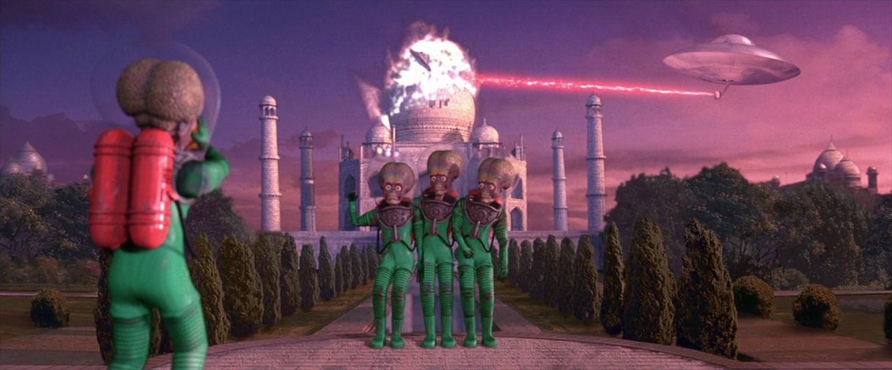 Martians pose in front of the Taj Mahal as the dome is destroyed by a ray from a flying saucer.