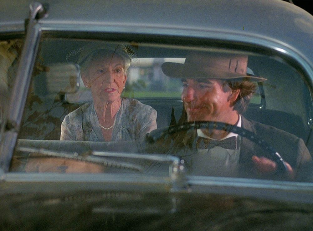 Sam Beckett (Scott Bakula) drives an elderly woman.
